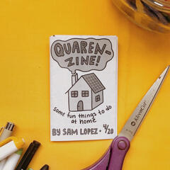 An overhead shot of a small zine with a house on the front